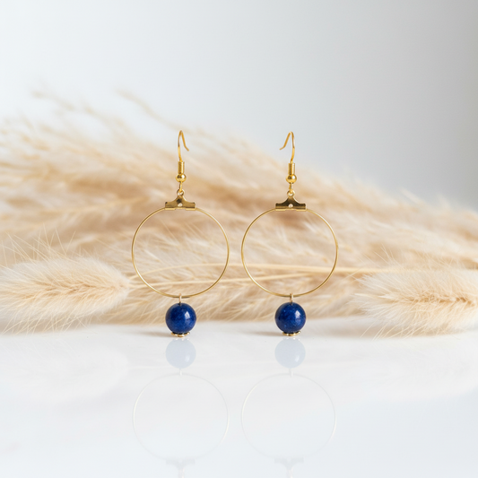 Boucles créoles dorées avec perles bleues marine pendantes