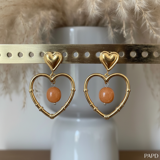 Boucles d’oreilles en acier inox doré avec cœurs et pierre quartz orange, pendantes