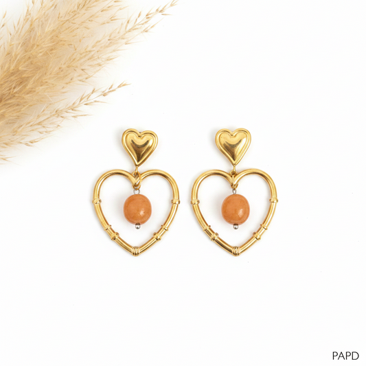 Paire de boucles d’oreilles cœur doré avec pierre quartz orange sur anneau
