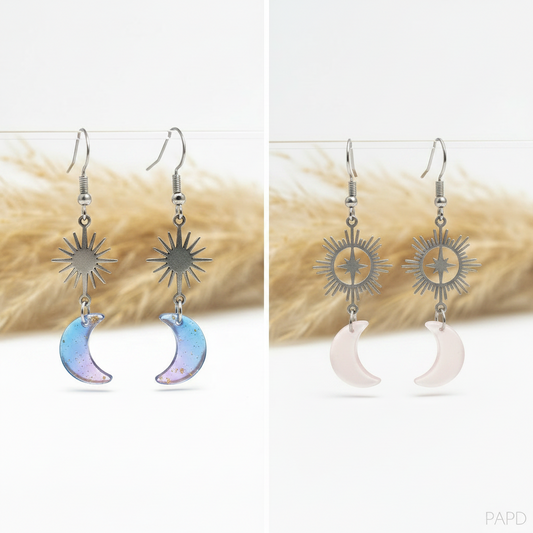 Boucles d'oreilles pendantes argentées: lunes en résine bleue ou rose, soleils filigranés